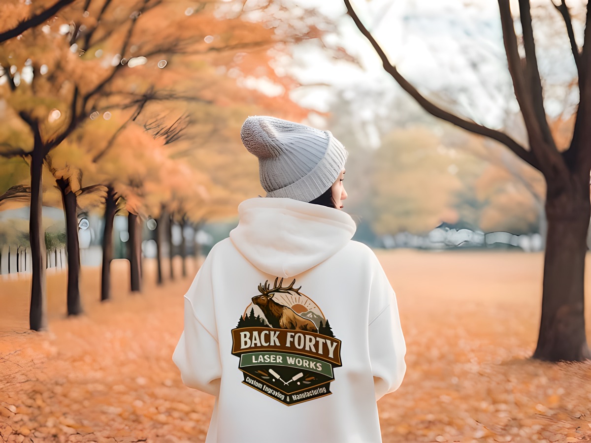Custom engraved Back Forty Laser Works logo patch on a white hoodie